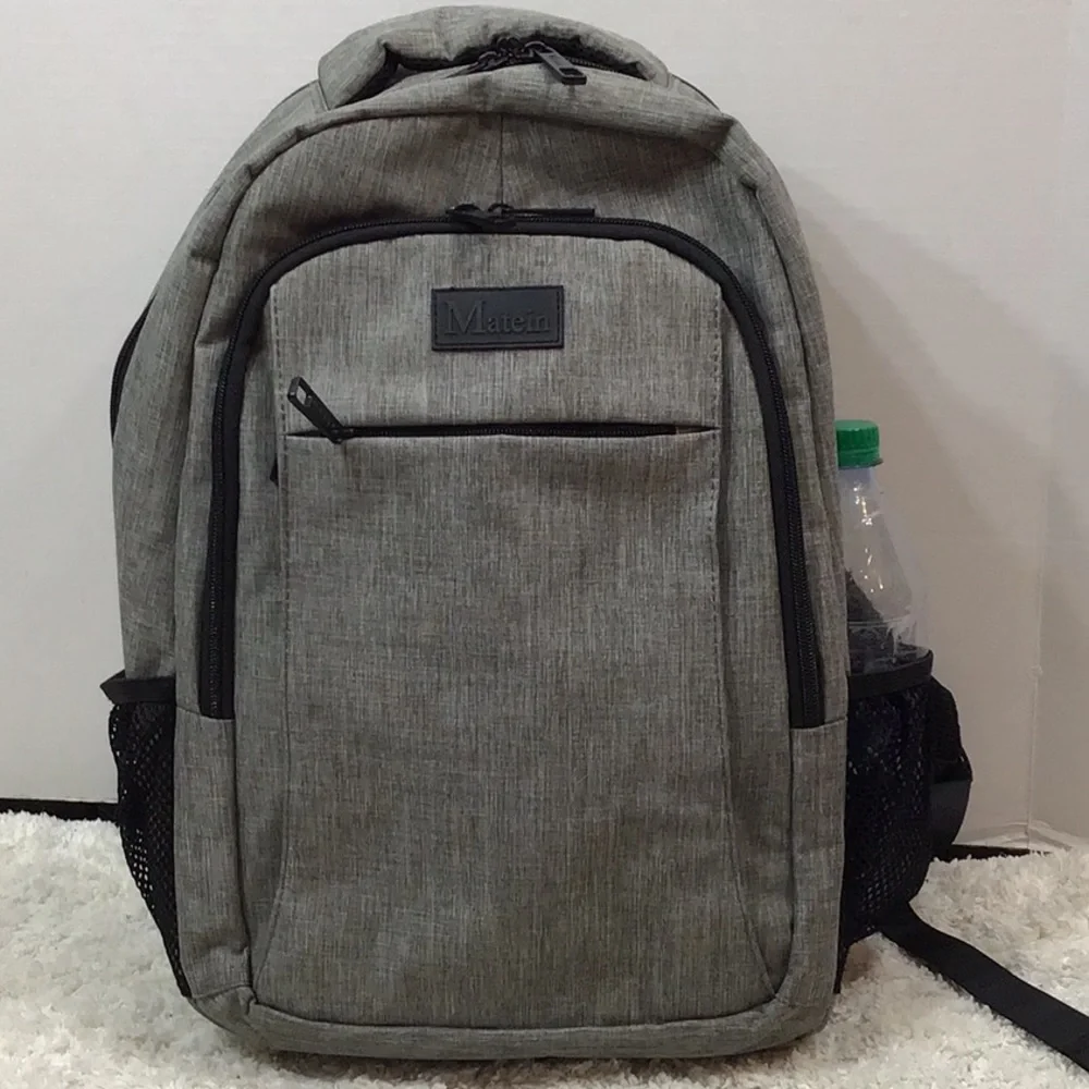 Matein gray fabric multi pocket backpack NWOT